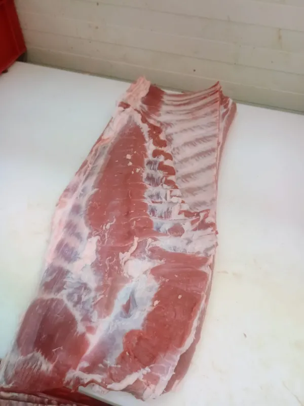 Frozen pork belly, grade A, bone in, rind off