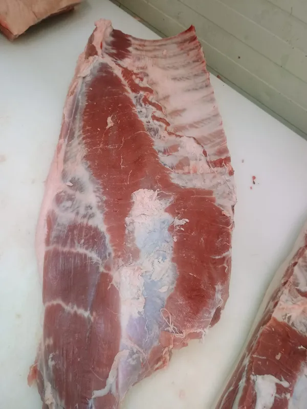Frozen pork belly, grade A, bone in, rind off 2
