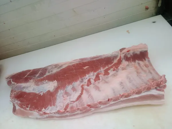 Frozen pork belly, grade A, bone in, rind off 3
