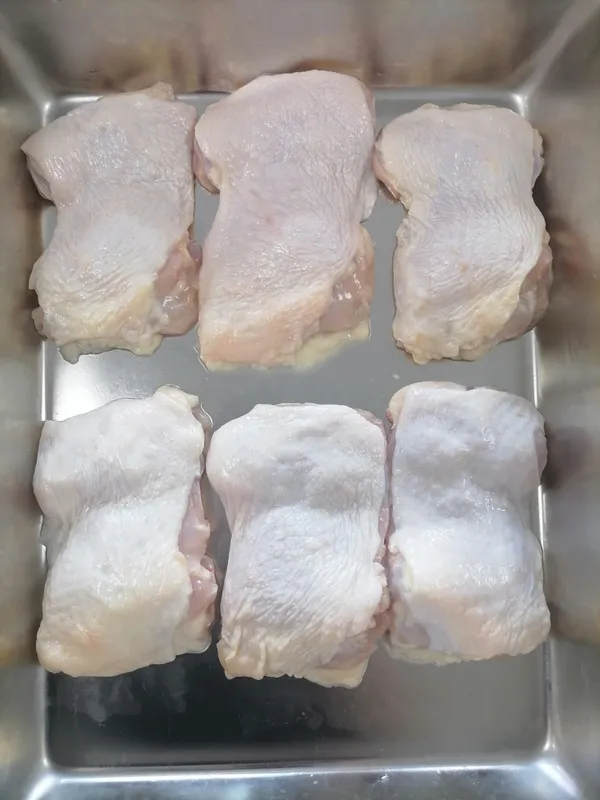 Frozen chicken thigh meat, boneless