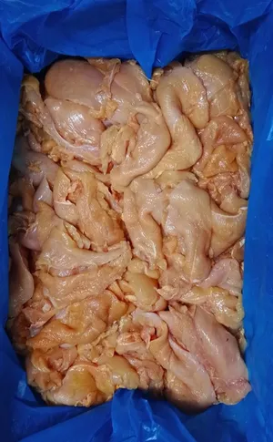 Frozen yellow chicken breast trimmings, poliblock